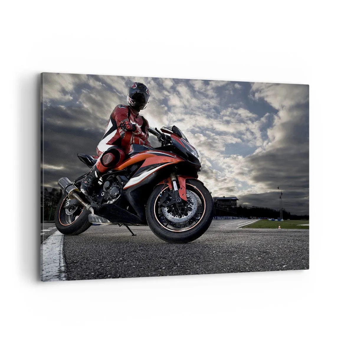 Bild auf Leinwand - Leinwandbild - Ein Motorradfahrer auf einem Sportmotorrad vor bewölktem Himmel - 100x70cm - Dunkler Reiter - Moderne Wanddekoration für Wohnzimmer und Schlafzimmer ARTTOR