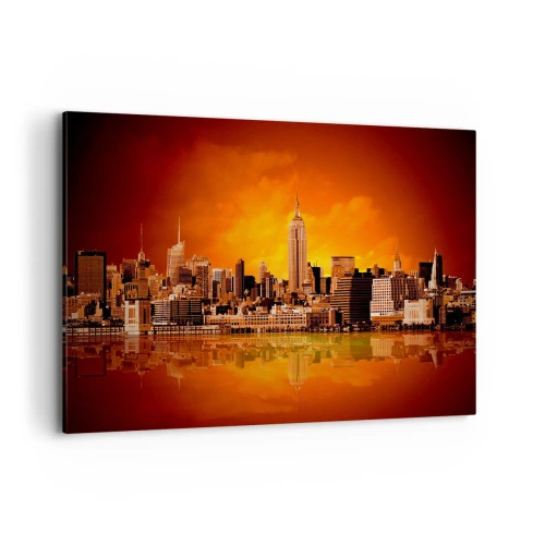 Bild auf Leinwand - Leinwandbild - Panorama der Stadt bei Sonnenuntergang mit im Wasser reflektierten Gebäuden - 120x80cm - Das Großstadtpanorama in Gelb und Bronze - Moderne Wanddekoration für Wohnzimmer und Schlafzimmer ARTTOR