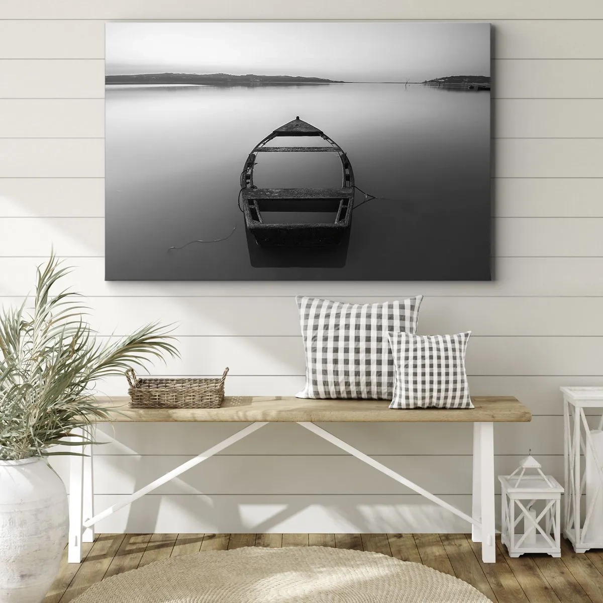 Bild auf Leinwand - Leinwandbild - Ein einsames Boot auf einem ruhigen See in Schwarz-Weiß-Tönen - 70x50cm - Sehnsucht und Melancholie - Moderne Wanddekoration für Wohnzimmer und Schlafzimmer ARTTOR