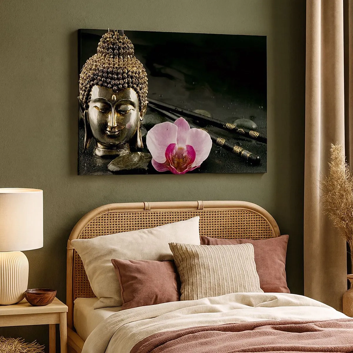 Bild auf Leinwand - Leinwandbild - Eine Buddha-Statuette mit Orchidee und Essstäbchen vor einem Hintergrund aus Steinen - 70x50cm - Harmonie von Weisheit und Schönheit - Moderne Wanddekoration für Wohnzimmer und Schlafzimmer ARTTOR
