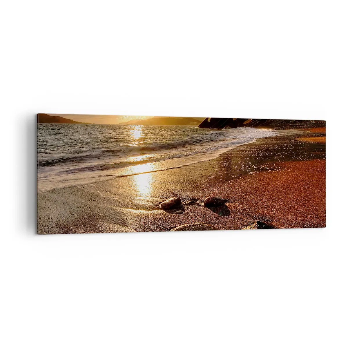 Bild auf Leinwand - Leinwandbild - Strand bei Sonnenuntergang mit Steinen am Ufer - 140x50cm - Folge der Sonne zu den Hügeln - Moderne Wanddekoration für Wohnzimmer und Schlafzimmer ARTTOR