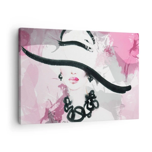 Bild auf Leinwand - Leinwandbild - Eine elegante Frau mit Hut vor einem Hintergrund aus rosa Abstraktionen. - 70x50cm - Bildnis einer Dame in Schwarz und Pink - Moderne Wanddekoration für Wohnzimmer und Schlafzimmer ARTTOR