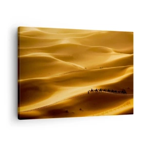 Bild auf Leinwand - Leinwandbild - Eine Karawane von Kamelen wandert durch die goldenen Dünen der Wüste. - 70x50cm - Wohnwagen in den Wüstenwellen - Moderne Wanddekoration für Wohnzimmer und Schlafzimmer ARTTOR