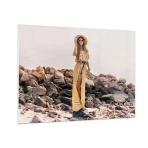 Glasbild - Bild auf glas - Eine Frau in einem Kleid im Boho-Stil vor einer felsigen Küste - 70x50cm - Die Magie der Steine - Moderne Wanddekoration für Wohnzimmer und Schlafzimmer ARTTOR