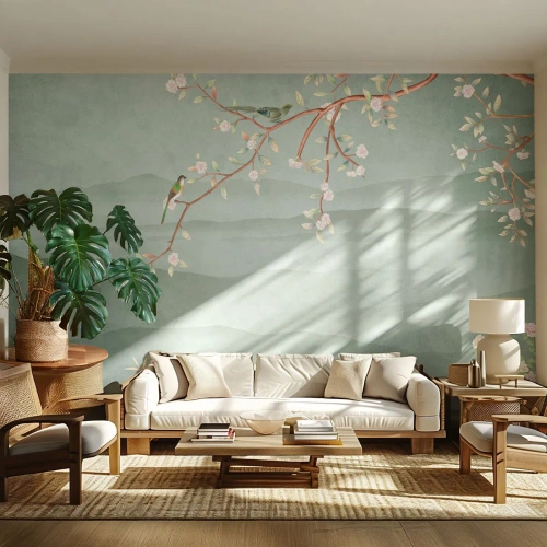 Fototapete Standard Eco - Ein blühender Zweig mit Vögeln vor dem Hintergrund grüner Hügel - 100x70cm - Frühling, oh, du bist es - Moderne Wanddekoration für Wohnzimmer und Schlafzimmer ARTTOR