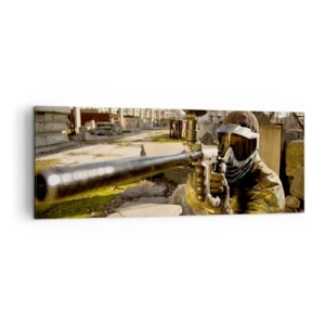 Bild auf Leinwand - Leinwandbild - Ein Paintball-Spieler in Tarnkleidung zielt mit einem Markierer - 140x50cm - Auch du kannst ein Held werden - Moderne Wanddekoration für Wohnzimmer und Schlafzimmer ARTTOR