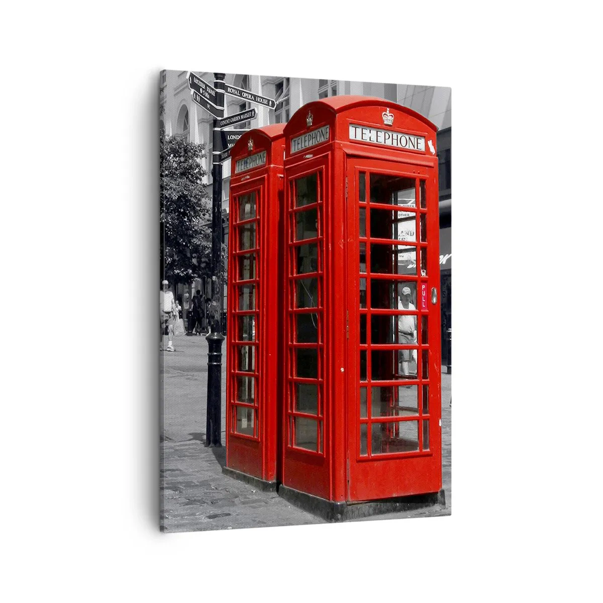 Bild auf Leinwand - Leinwandbild - Rote Telefonzellen vor einer schwarz-weißen Stadtkulisse. - 50x70cm - Rote Telefonzellen - Moderne Wanddekoration für Wohnzimmer und Schlafzimmer ARTTOR