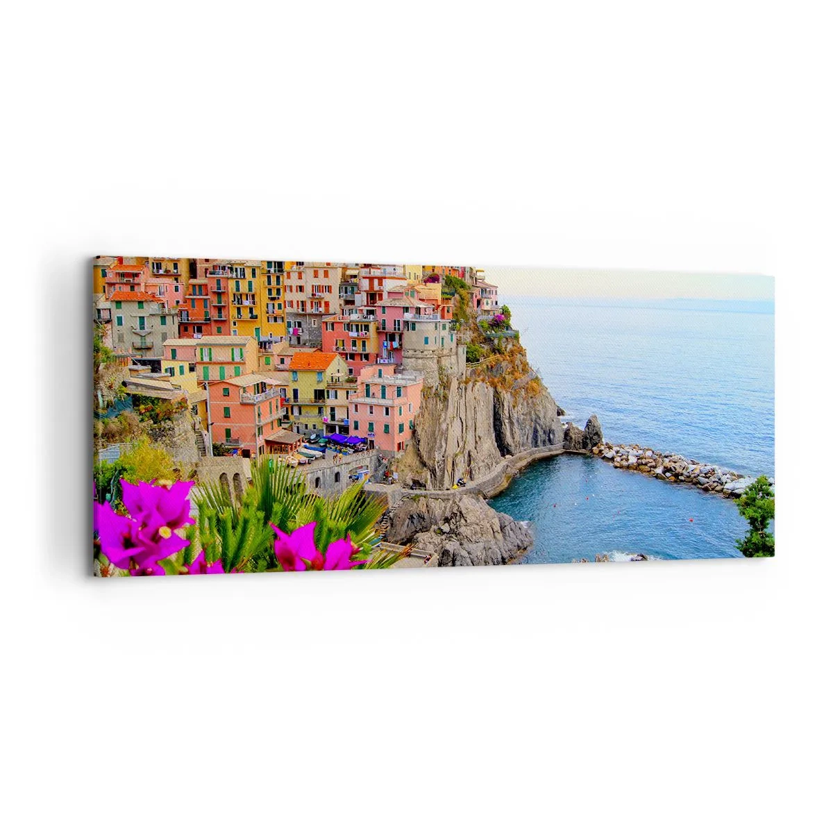 Bild auf Leinwand - Leinwandbild - Bunte Häuser auf einer Klippe mit Blick auf das Meer in einer malerischen Landschaft - 120x50cm - Lachende Stadt - Moderne Wanddekoration für Wohnzimmer und Schlafzimmer ARTTOR