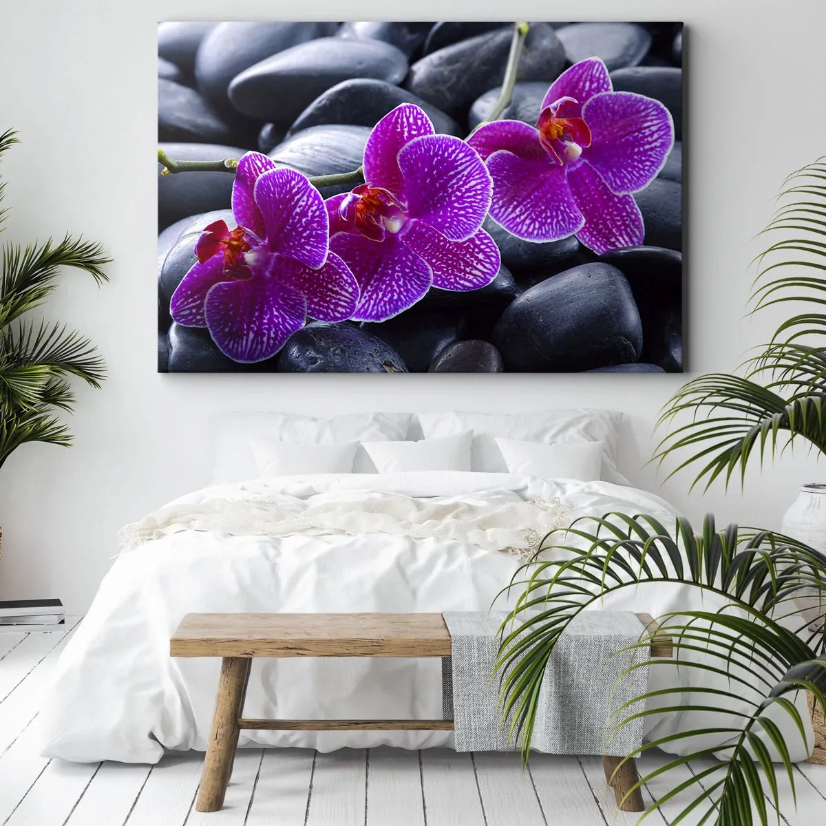 Bild auf Leinwand - Leinwandbild - Lila Orchideen vor einem Hintergrund aus schwarzen Steinen - 120x80cm - Die Steine