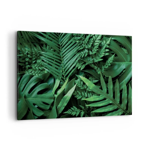 Bild auf Leinwand - Leinwandbild - Grüne tropische Blätter in einer dichten und natürlichen Komposition - 120x80cm - Eingebettet ins Grüne - Moderne Wanddekoration für Wohnzimmer und Schlafzimmer ARTTOR
