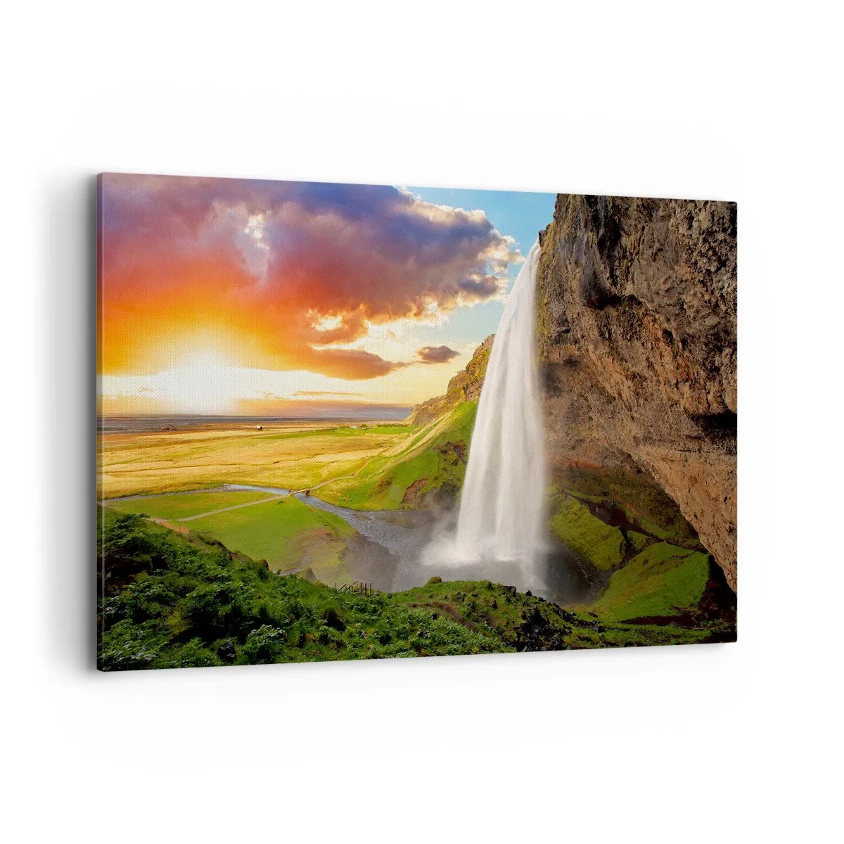Bild auf Leinwand - Leinwandbild - Ein Wasserfall in einer malerischen Landschaft bei Sonnenuntergang - 120x80cm - Die Fülle des isländischen Sommers - Moderne Wanddekoration für Wohnzimmer und Schlafzimmer ARTTOR