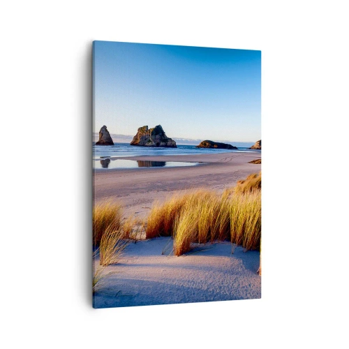 Bild auf Leinwand - Leinwandbild - Ein malerischer Strand mit Blick auf die Felsen und das Meer bei Sonnenuntergang - 50x70cm - Für Friedenssuchende - Moderne Wanddekoration für Wohnzimmer und Schlafzimmer ARTTOR