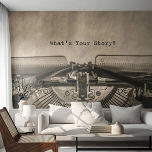 Fototapete Standard Eco - Eine Schreibmaschine mit einem Stück Papier und den Worten „Was ist deine Geschichte?“ darauf - 100x70cm - Erzähl es mir - Moderne Wanddekoration für Wohnzimmer und Schlafzimmer ARTTOR