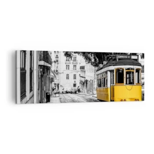 Bild auf Leinwand - Leinwandbild - Eine gelbe Straßenbahn vor dem Hintergrund einer schwarz-weißen Straße - 140x50cm - Und Fado im Hintergrund - Moderne Wanddekoration für Wohnzimmer und Schlafzimmer ARTTOR