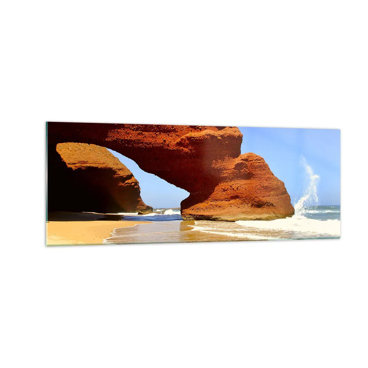 Glasbild - Bild auf glas - Ein natürlicher Felsbogen an einem Strand mit blauem Himmel und Wellen - 140x50cm - Wasser und Wind seit Tausenden von Jahren - Moderne Wanddekoration für Wohnzimmer und Schlafzimmer ARTTOR