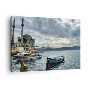 Bild auf Leinwand - Leinwandbild - Ein historisches Gebäude auf dem Wasser mit Booten und einer Brücke im Hintergrund - 70x50cm - An der Grenze der Welten - Moderne Wanddekoration für Wohnzimmer und Schlafzimmer ARTTOR