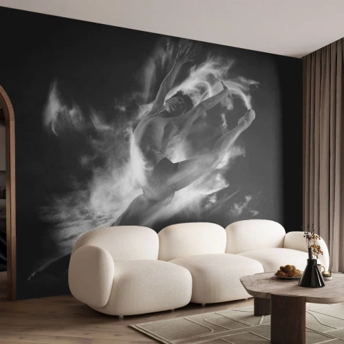 Fototapete Premium Canvas - Eine Tänzerin in dynamischer Pose vor schwarzem Hintergrund - 100x70cm - Im Flug hängen geblieben - Moderne Wanddekoration für Wohnzimmer und Schlafzimmer ARTTOR