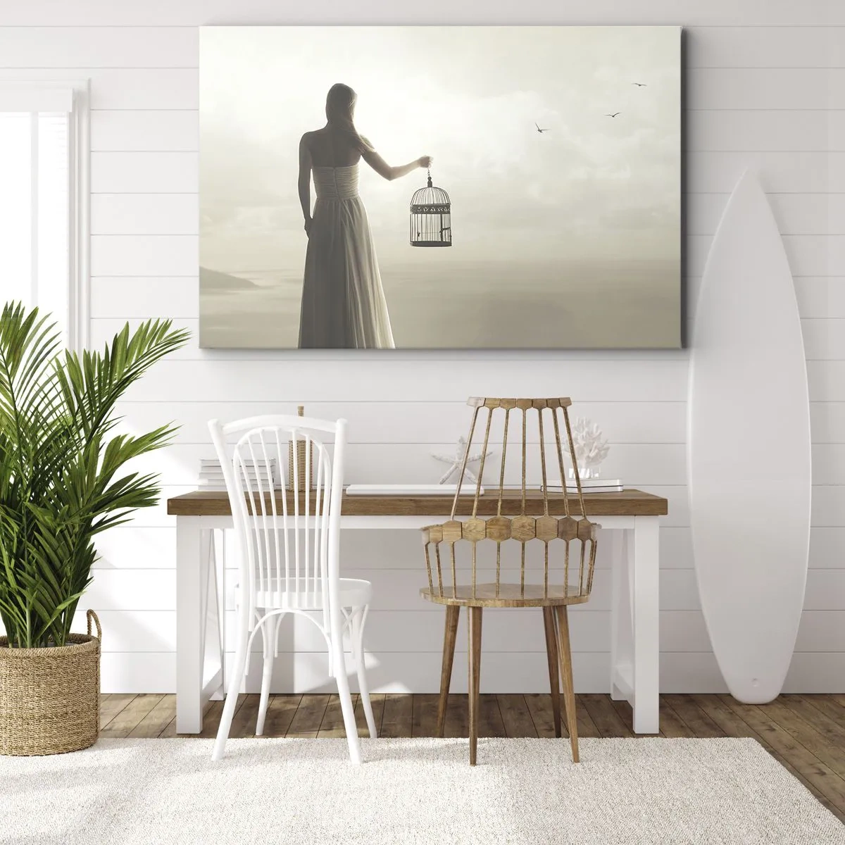 Bild auf Leinwand - Leinwandbild - Eine Frau mit einem Käfig vor einem ruhigen Himmel - 100x70cm - Sei frei - Moderne Wanddekoration für Wohnzimmer und Schlafzimmer ARTTOR