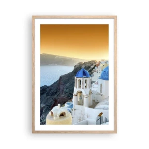 Poster in einem Rahmen aus heller Eiche - Santorini - an die Felsen gekuschelt - 50x70 cm