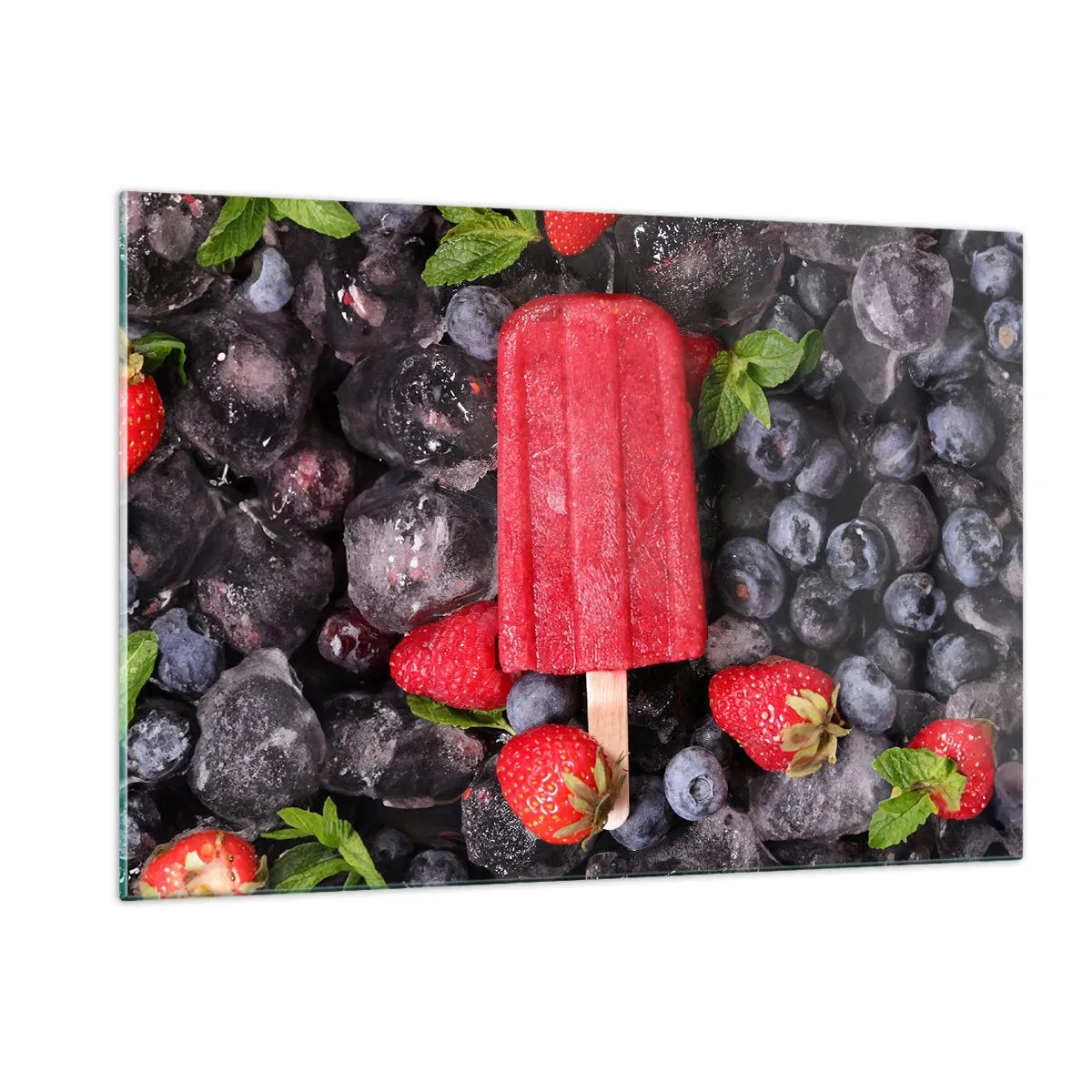 Glasbild - Bild auf glas - Ein Eisstiel zwischen gefrorenen Früchten und Minzblättern - 120x80cm - So schmeckt der heiße Sommer - Moderne Wanddekoration für Wohnzimmer und Schlafzimmer ARTTOR