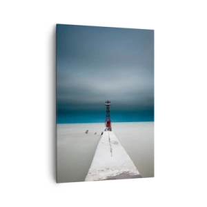 Bild auf Leinwand - Leinwandbild - Ein Leuchtturm am Ende eines Betonpfeilers in einer kargen Landschaft - 70x100cm - Um der Weite zu begegnen - Moderne Wanddekoration für Wohnzimmer und Schlafzimmer ARTTOR