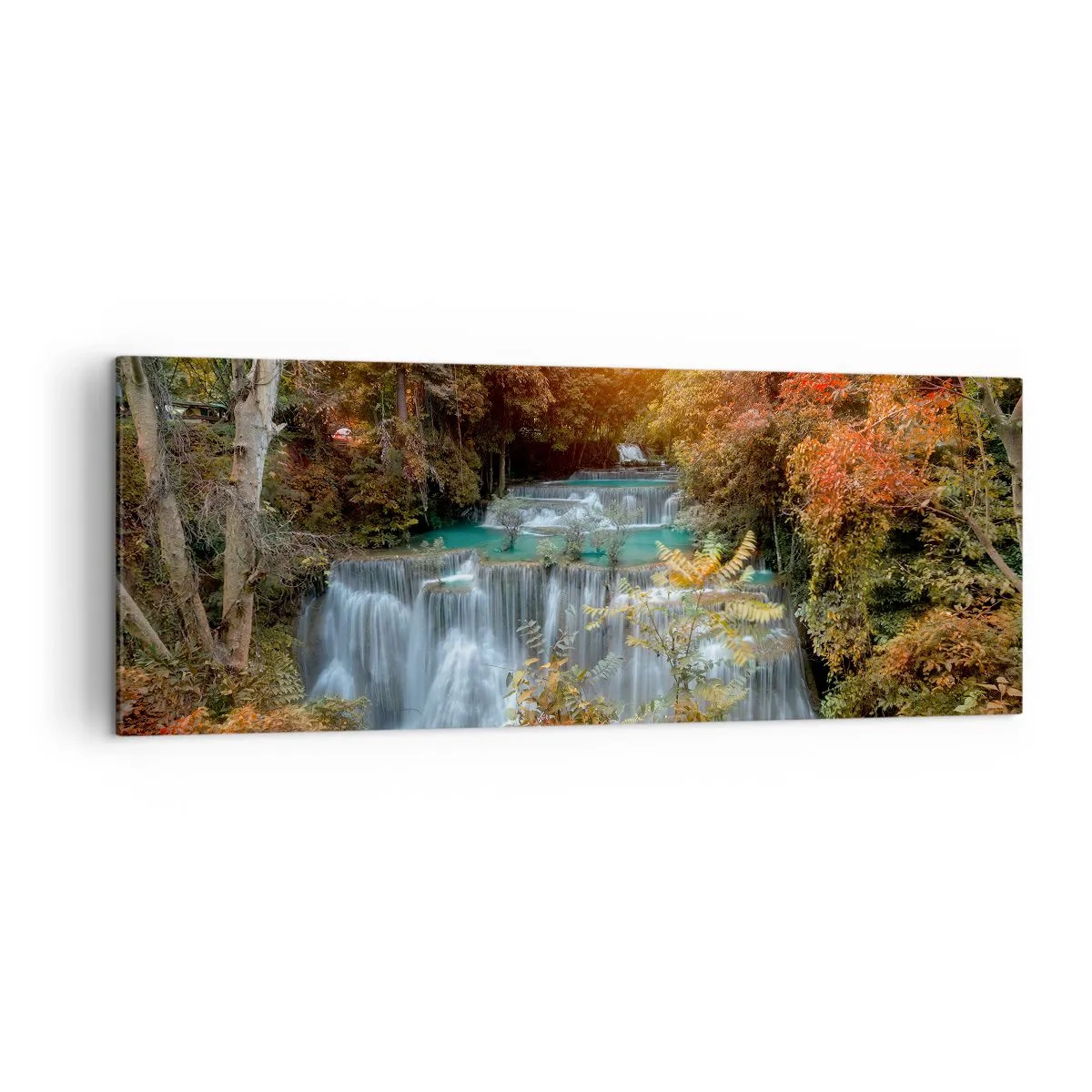Bild auf Leinwand - Leinwandbild - Herbstlicher Wasserfall, umgeben von bunten Bäumen im Sonnenlicht - 140x50cm - Versteckter Schatz des Waldes - Moderne Wanddekoration für Wohnzimmer und Schlafzimmer ARTTOR
