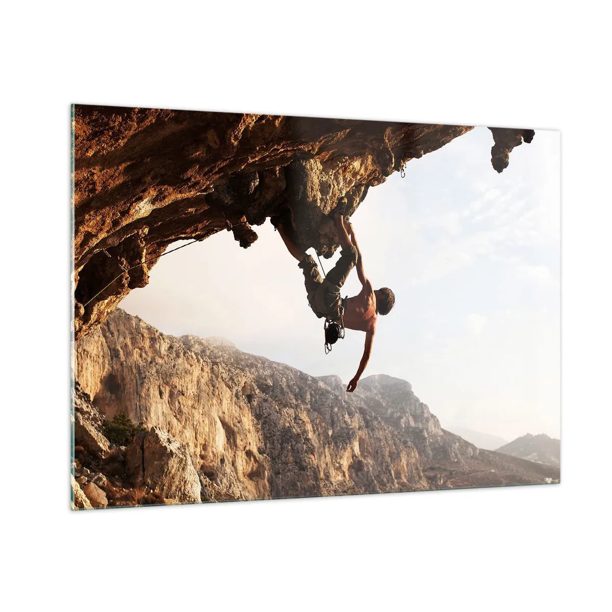 Glasbild - Bild auf glas - Klettern an einem senkrechten Felsen in einer Berglandschaft - 100x70cm - Die Welt ist in einer Hand auf einem Felsblock geschrumpft - Moderne Wanddekoration für Wohnzimmer und Schlafzimmer ARTTOR