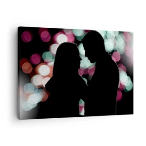 Bild auf Leinwand - Leinwandbild - Silhouetten eines Paares vor dem Hintergrund bunter Bokeh-Lichter - 70x50cm - Jawohl! - Moderne Wanddekoration für Wohnzimmer und Schlafzimmer ARTTOR
