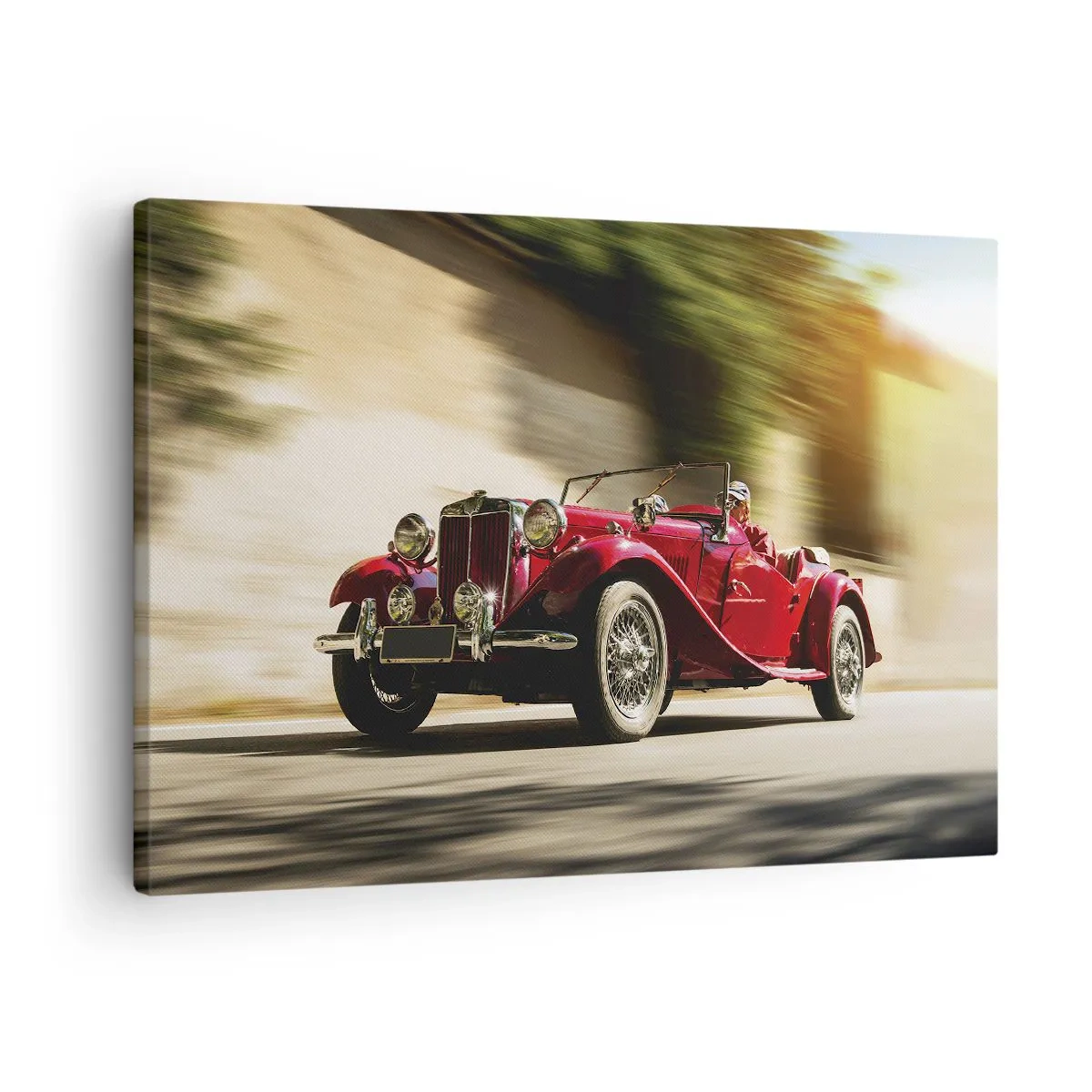Bild auf Leinwand - Leinwandbild - Roter Oldtimer in Bewegung auf einer sonnigen Straße - 70x50cm - Schöner als Nike von Samothrake - Moderne Wanddekoration für Wohnzimmer und Schlafzimmer ARTTOR