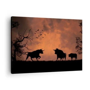 Bild auf Leinwand - Leinwandbild - Silhouetten von Stieren vor einem orangefarbenen Himmel bei Sonnenuntergang - 70x50cm - Ein dramatisches Naturschauspiel - Moderne Wanddekoration für Wohnzimmer und Schlafzimmer ARTTOR
