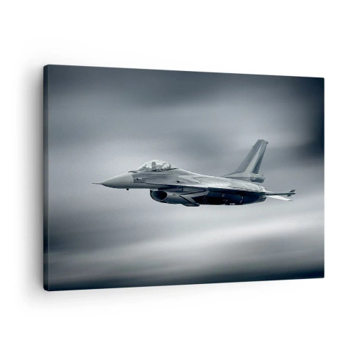 Bild auf Leinwand - Leinwandbild - Ein Kampfjet im Flug vor einem bewölkten Himmel - 70x50cm - Wirst du herausfordern? - Moderne Wanddekoration für Wohnzimmer und Schlafzimmer ARTTOR