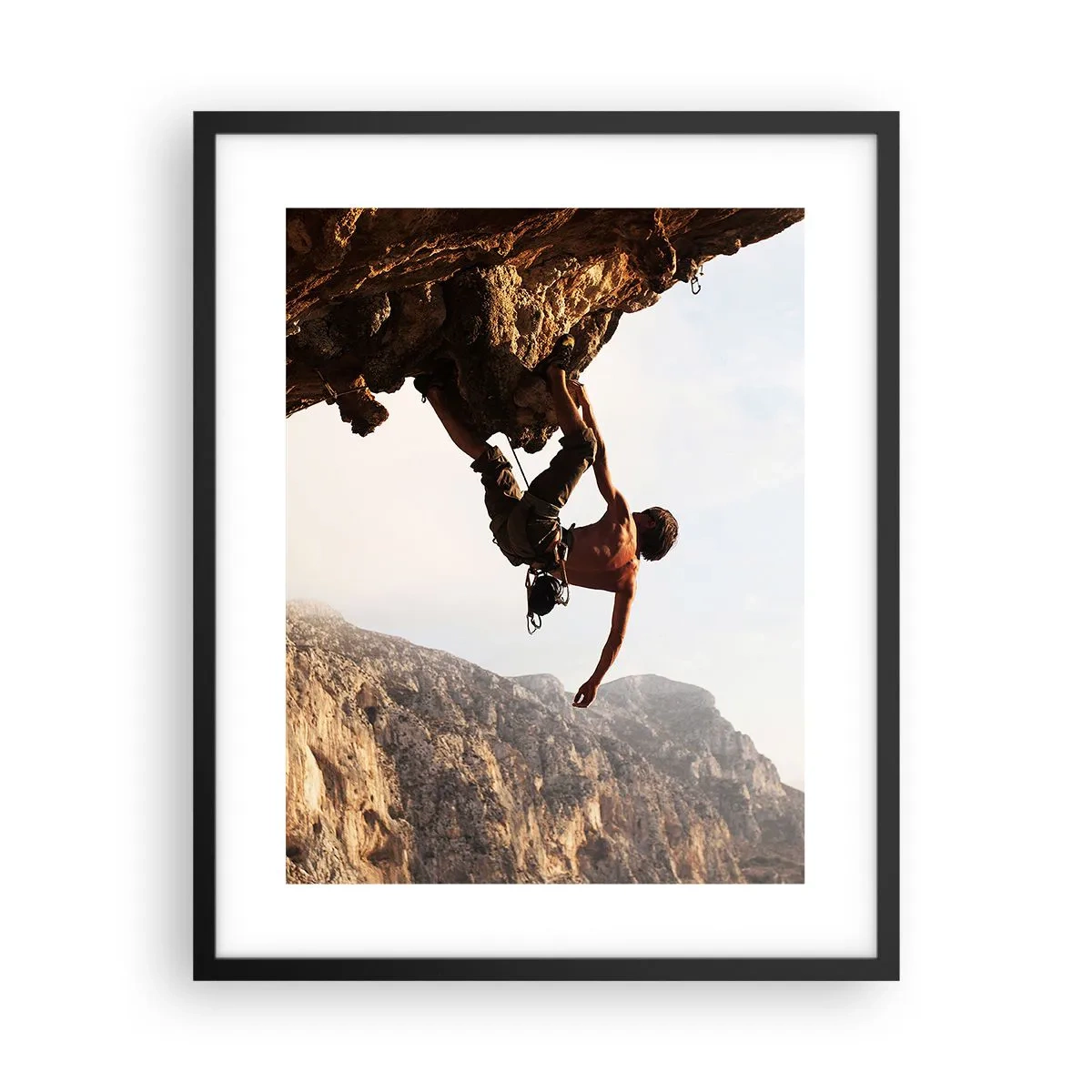 Poster in einem schwarzem Rahmen - Die Welt ist in einer Hand auf einem Felsblock geschrumpft - 40x50 cm