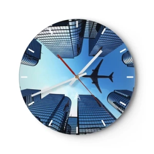 Wanduhr - Glasuhr - Ein Flugzeug über modernen Wolkenkratzern vor blauem Himmel - 30x30cm - Der Blick aus der Glasschlucht - Moderne Wanddekoration für Wohnzimmer, Küche und Schlafzimmer ARTTOR