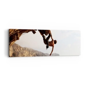 Bild auf Leinwand - Leinwandbild - Die Welt ist in einer Hand auf einem Felsblock geschrumpft - 90x30 cm