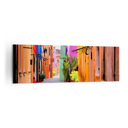 Bild auf Leinwand - Leinwandbild - Eine bunte Straße mit Mietshäusern in hellen Farbtönen - 160x50cm - Regenbogengasse - Moderne Wanddekoration für Wohnzimmer und Schlafzimmer ARTTOR