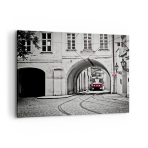 Bild auf Leinwand - Leinwandbild - Eine schwarz-weiße Straßenbahn in einer historischen Stadtstraße - 100x70cm - Durch das Stadtlabyrinth - Moderne Wanddekoration für Wohnzimmer und Schlafzimmer ARTTOR