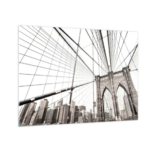 Glasbild - Bild auf glas - Eine Hängebrücke mit einem Stadtpanorama im Hintergrund in Sepia - 70x50cm - New Yorker Kathedrale - Moderne Wanddekoration für Wohnzimmer und Schlafzimmer ARTTOR