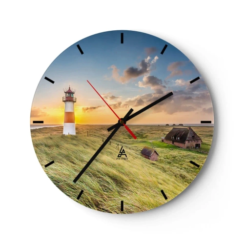 Wanduhr - Glasuhr - Ein Leuchtturm mit Sonnenuntergang und Landhäusern im Hintergrund - 30x30cm - Zwischen den Wellen - Moderne Wanddekoration für Wohnzimmer, Küche und Schlafzimmer ARTTOR
