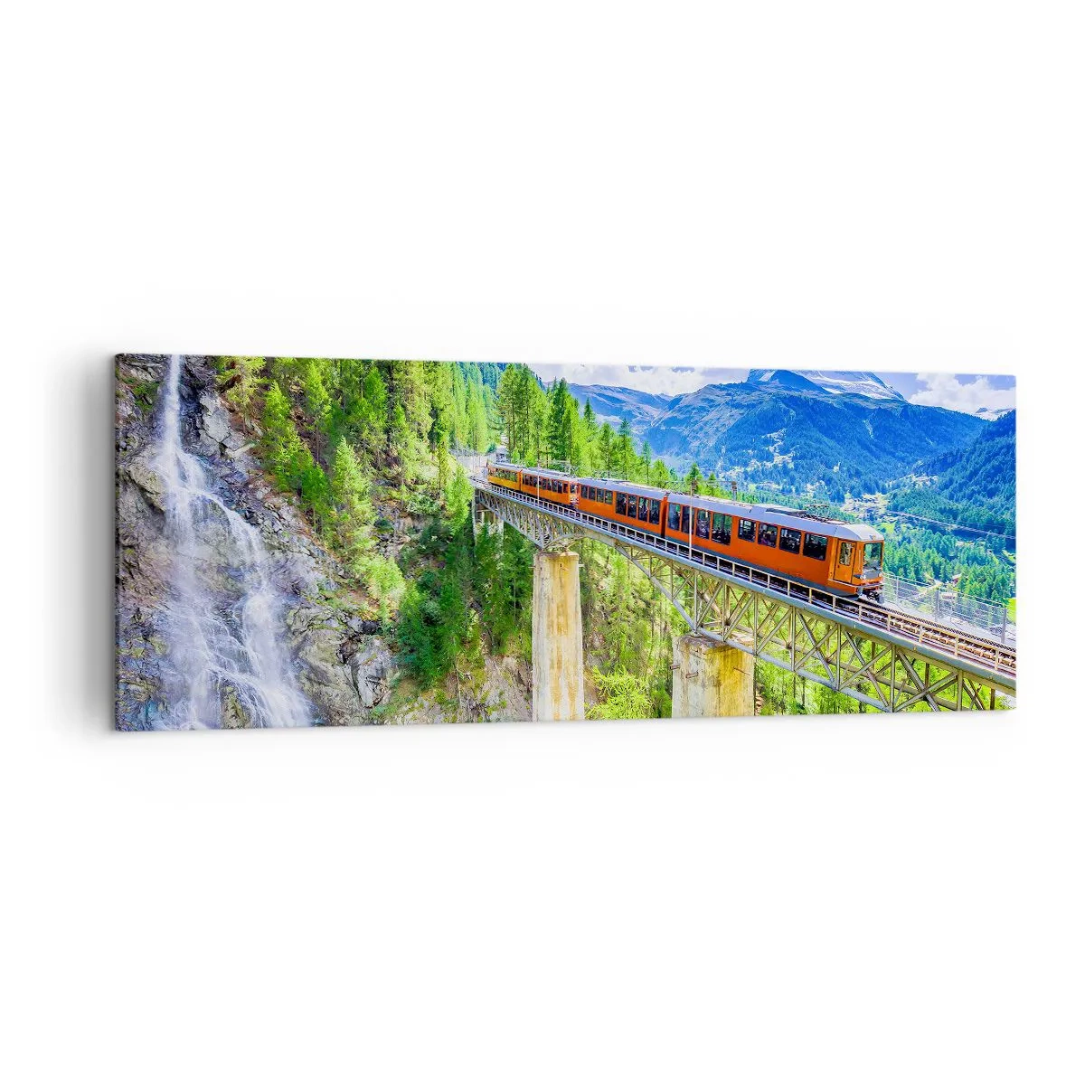 Bild auf Leinwand - Leinwandbild - Eine Achterbahn auf einer Brücke mit Blick auf einen Wasserfall und Berge - 140x50cm - Jetzt sind Alpen dran - Moderne Wanddekoration für Wohnzimmer und Schlafzimmer ARTTOR