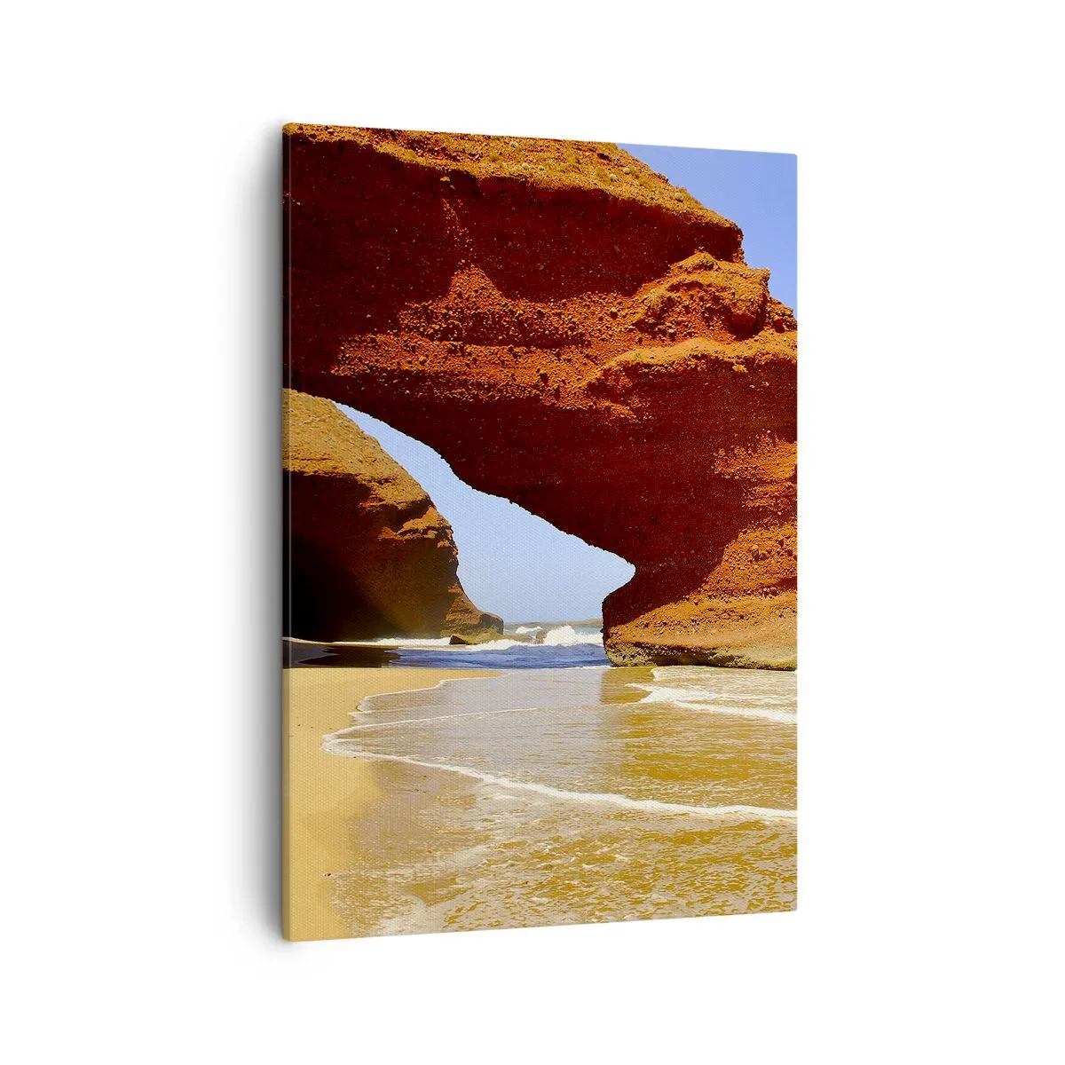 Bild auf Leinwand - Leinwandbild - Ein natürlicher Felsbogen an einem Strand mit blauem Himmel und Wellen - 50x70cm - Wasser und Wind seit Tausenden von Jahren - Moderne Wanddekoration für Wohnzimmer und Schlafzimmer ARTTOR
