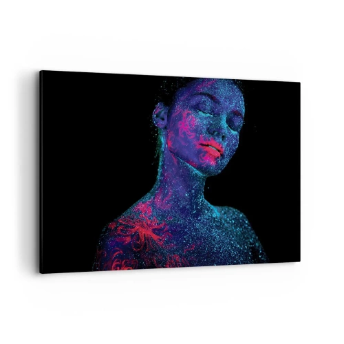 Bild auf Leinwand - Leinwandbild - Porträt einer Frau in Neonfarben auf schwarzem Hintergrund - 100x70cm - Im Sternenstaub - Moderne Wanddekoration für Wohnzimmer und Schlafzimmer ARTTOR