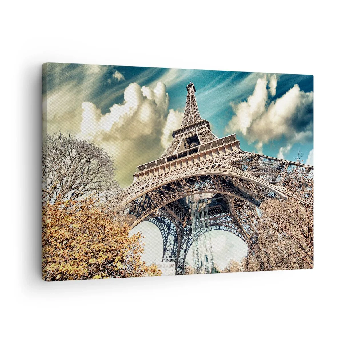 Bild auf Leinwand - Leinwandbild - Der Eiffelturm von unten in herbstlicher Kulisse - 70x50cm - Und im Herbst in Paris ... - Moderne Wanddekoration für Wohnzimmer und Schlafzimmer ARTTOR