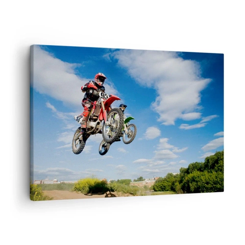 Bild auf Leinwand - Leinwandbild - Fahrer auf Motocross-Motorrädern in der Luft während eines Sprunges - 70x50cm - Himmelssprung - Moderne Wanddekoration für Wohnzimmer und Schlafzimmer ARTTOR