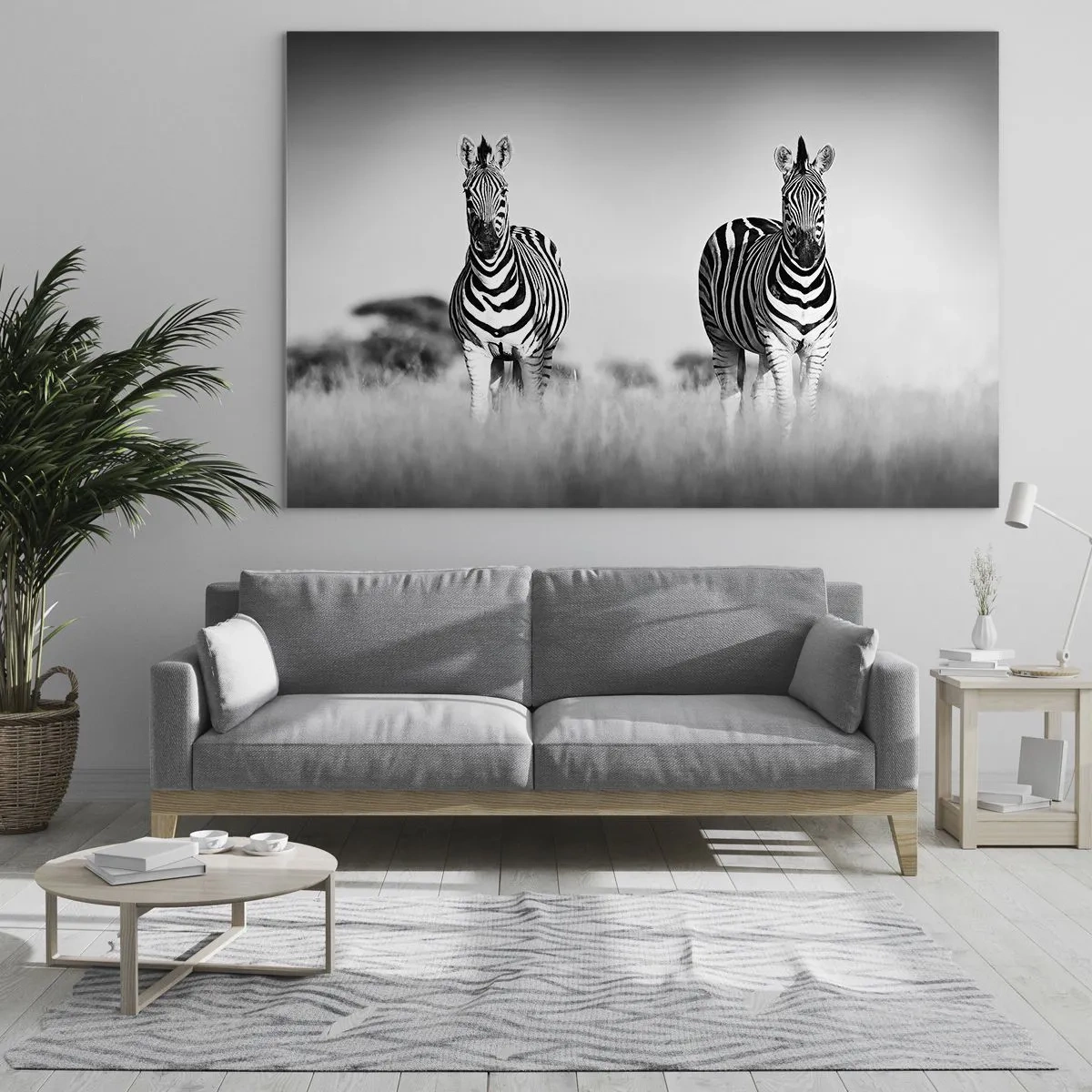 Glasbild - Bild auf glas - Ein Zebrapaar vor einem schwarz-weißen Grashintergrund, dargestellt in ihrem natürlichen Lebensraum. - 100x70cm - Die Welt ist doch schwarz-weiß - Moderne Wanddekoration für Wohnzimmer und Schlafzimmer ARTTOR