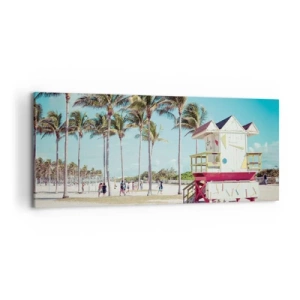 Bild auf Leinwand - Leinwandbild - Ein Strand mit Palmen und einem Rettungsschwimmerturm im Hintergrund - 120x50cm - Dir steht ein schöner Tag bevor - Moderne Wanddekoration für Wohnzimmer und Schlafzimmer ARTTOR