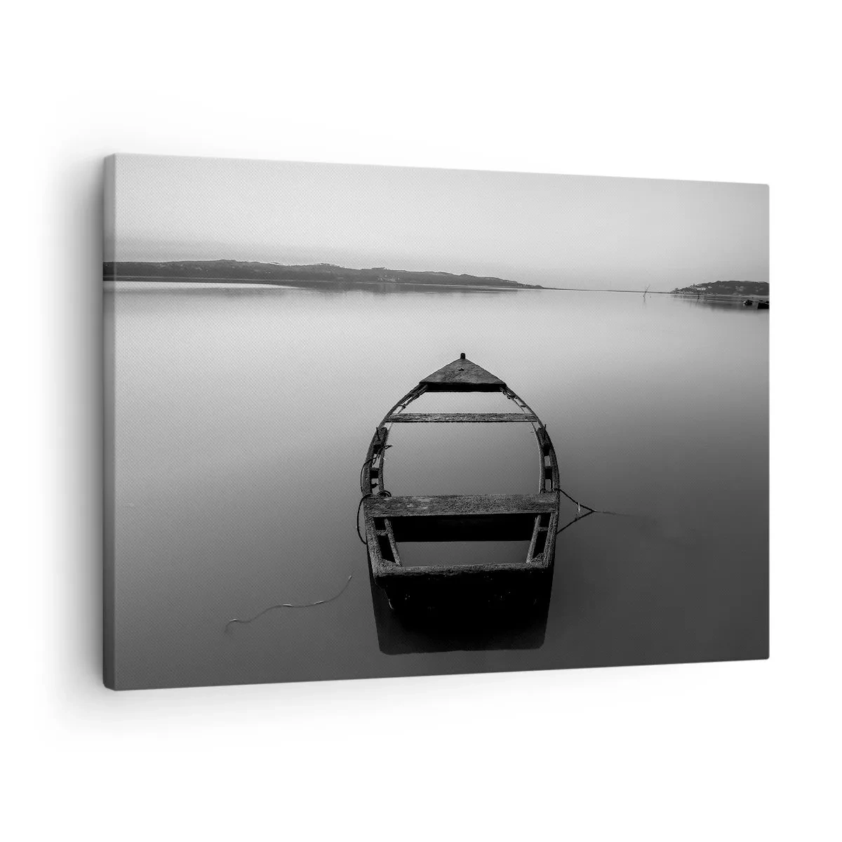 Bild auf Leinwand - Leinwandbild - Ein einsames Boot auf einem ruhigen See in Schwarz-Weiß-Tönen - 70x50cm - Sehnsucht und Melancholie - Moderne Wanddekoration für Wohnzimmer und Schlafzimmer ARTTOR