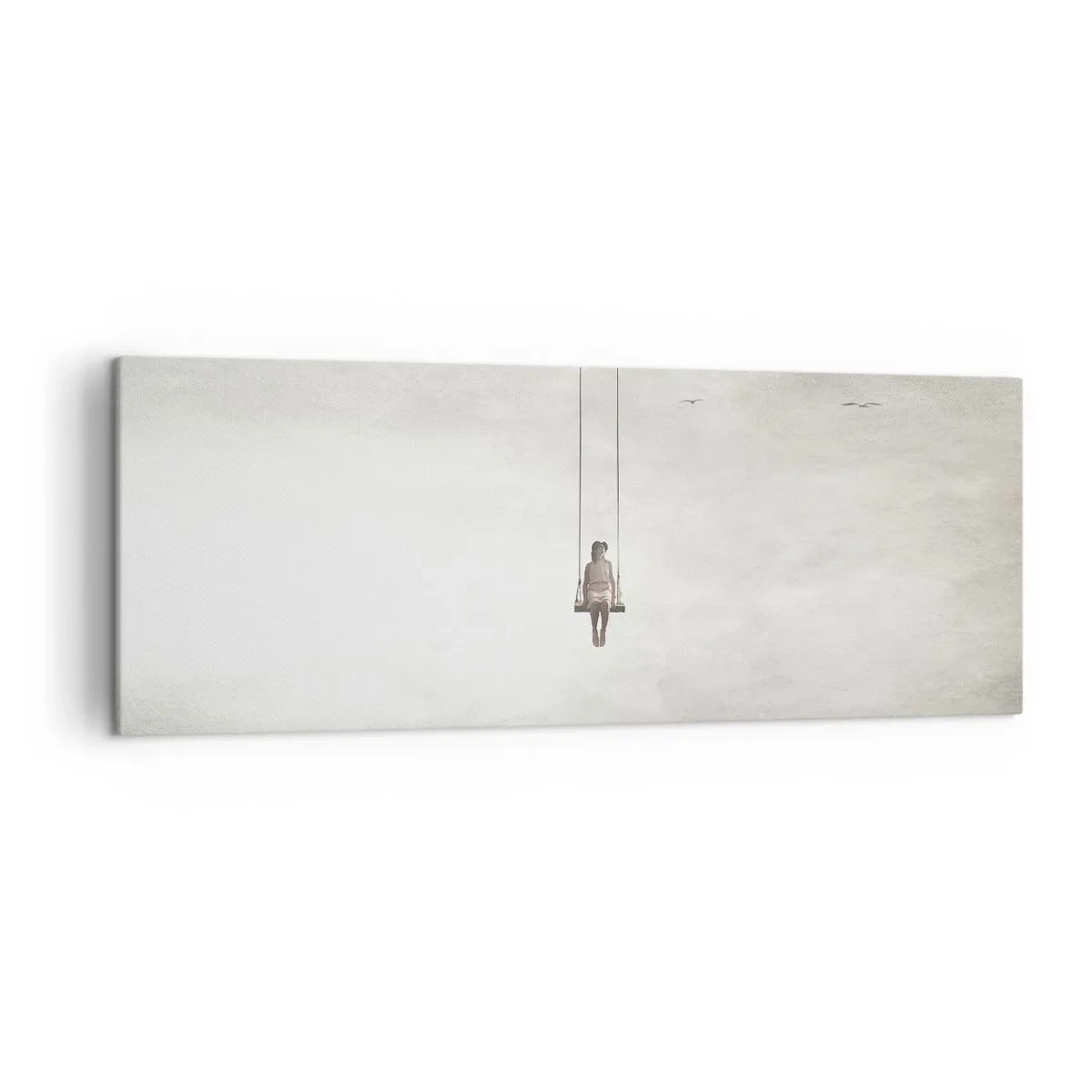 Bild auf Leinwand - Leinwandbild - Eine Figur auf einer Schaukel, die im Raum schwebt - 140x50cm - Ein Kind in uns - Moderne Wanddekoration für Wohnzimmer und Schlafzimmer ARTTOR