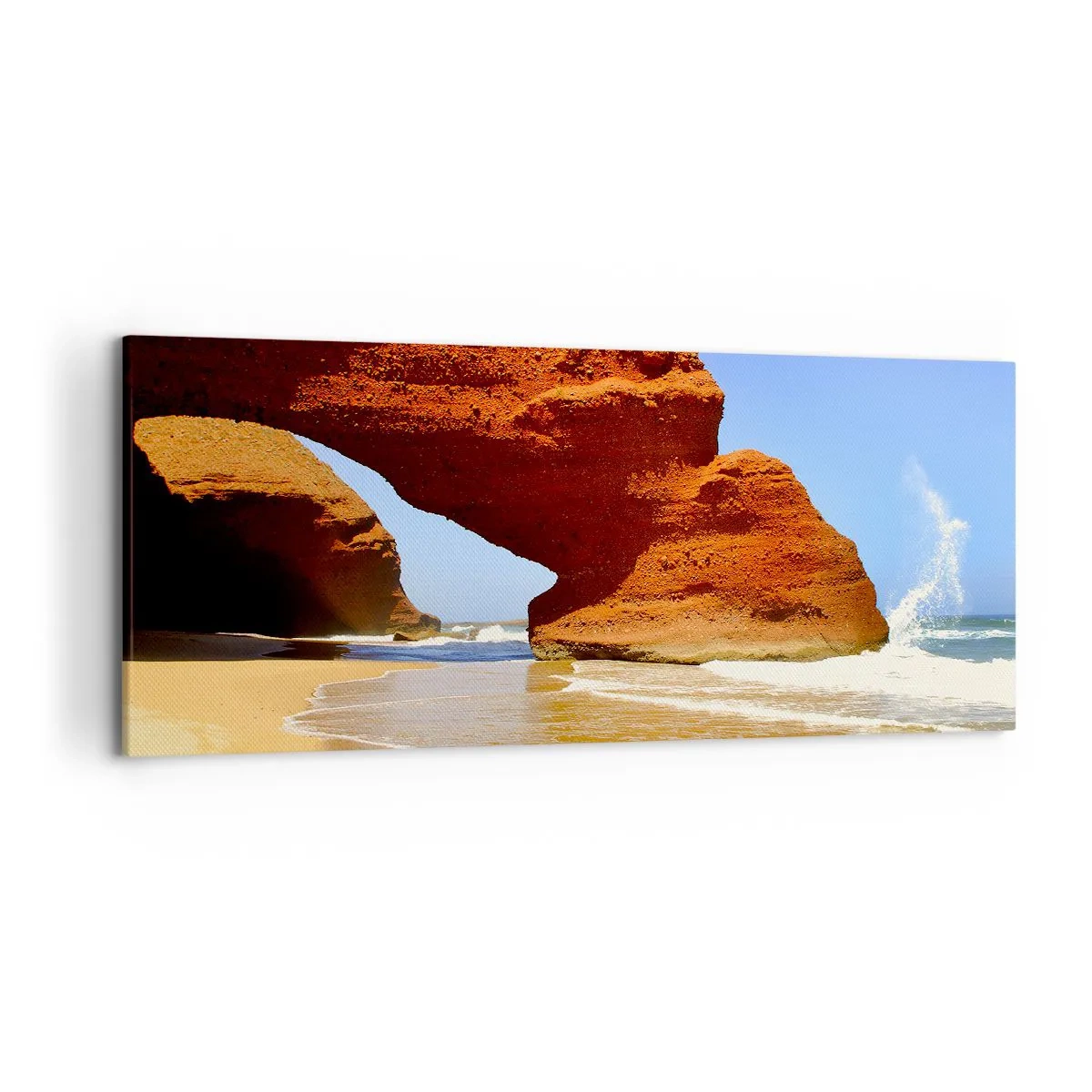 Bild auf Leinwand - Leinwandbild - Ein natürlicher Felsbogen an einem Strand mit blauem Himmel und Wellen - 120x50cm - Wasser und Wind seit Tausenden von Jahren - Moderne Wanddekoration für Wohnzimmer und Schlafzimmer ARTTOR