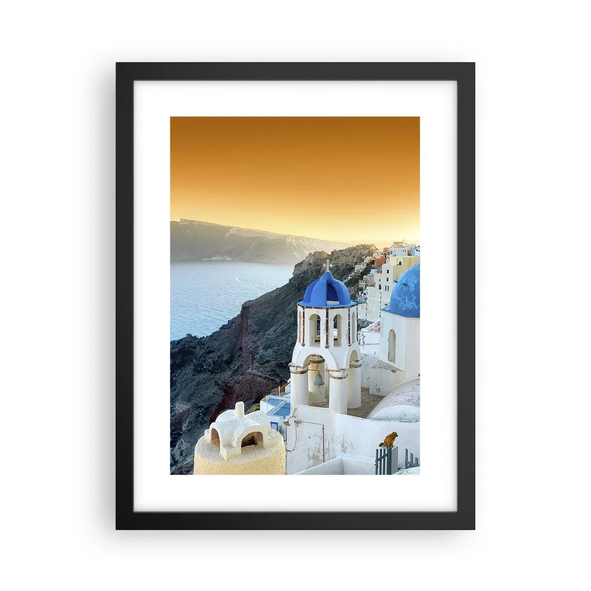 Poster in einem schwarzem Rahmen - Santorini - an die Felsen gekuschelt - 30x40 cm