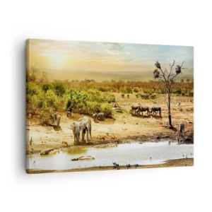Bild auf Leinwand - Leinwandbild - Elefanten und Wildtiere an einer Wasserstelle bei Sonnenuntergang - 70x50cm - Ein Fluss floss aus Eden ... - Moderne Wanddekoration für Wohnzimmer und Schlafzimmer ARTTOR